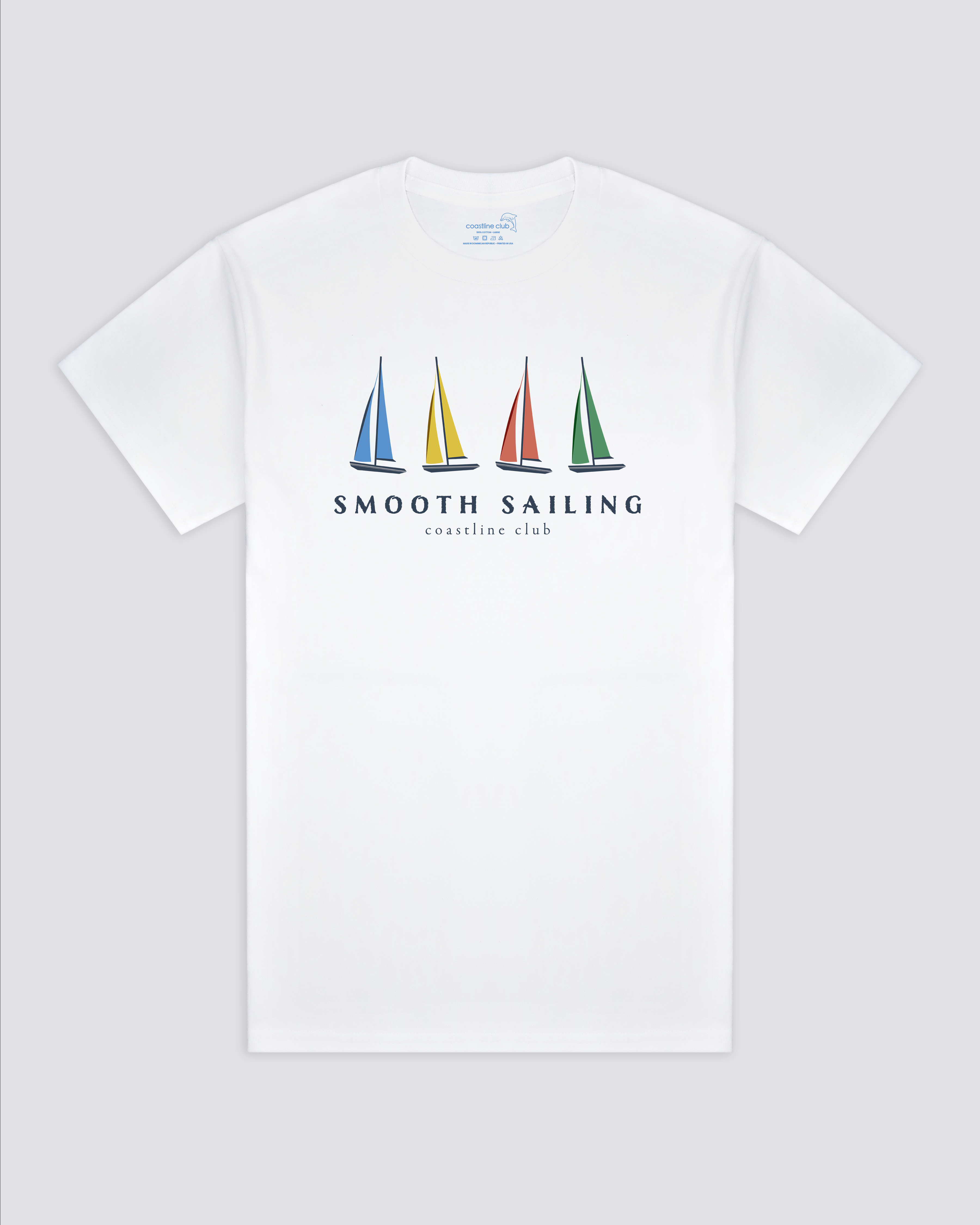 White t-shirt with colorful sailboat graphic and 'Smooth Sailing' text on a light gray background